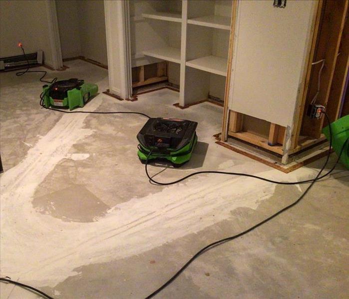 Drying equipment on floor.