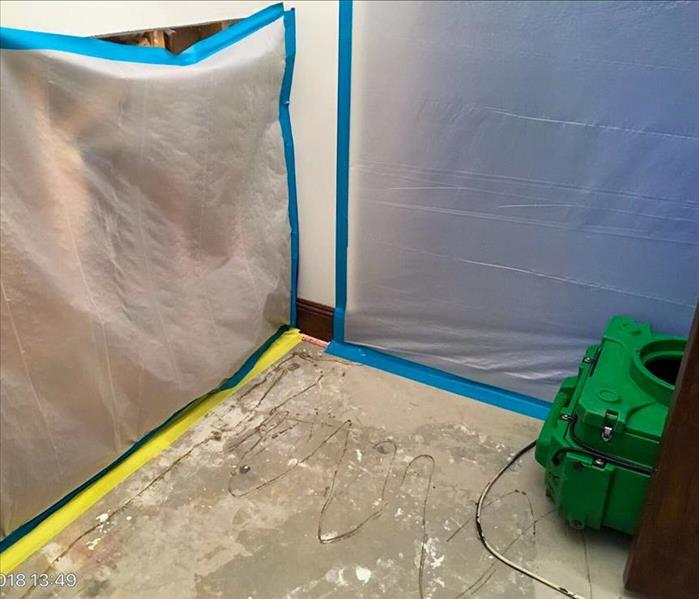 Plastic wrap containing water damage.
