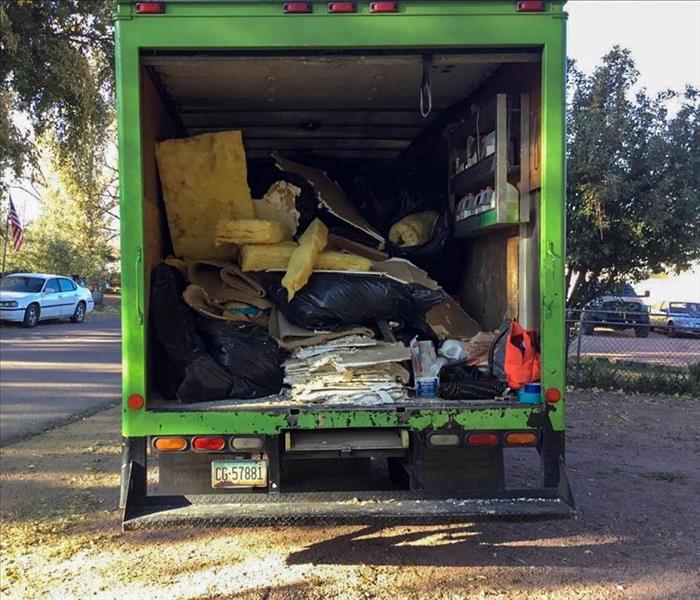 Removed materials in the back of a SERVPRO truck in Phoenix, AZ
